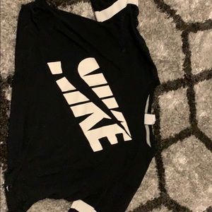 Cropped ish . Nike. Alittle mesh on sleeves.